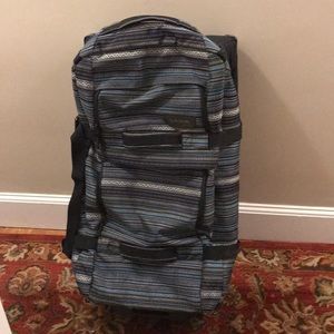 Dakine 110l roller bag